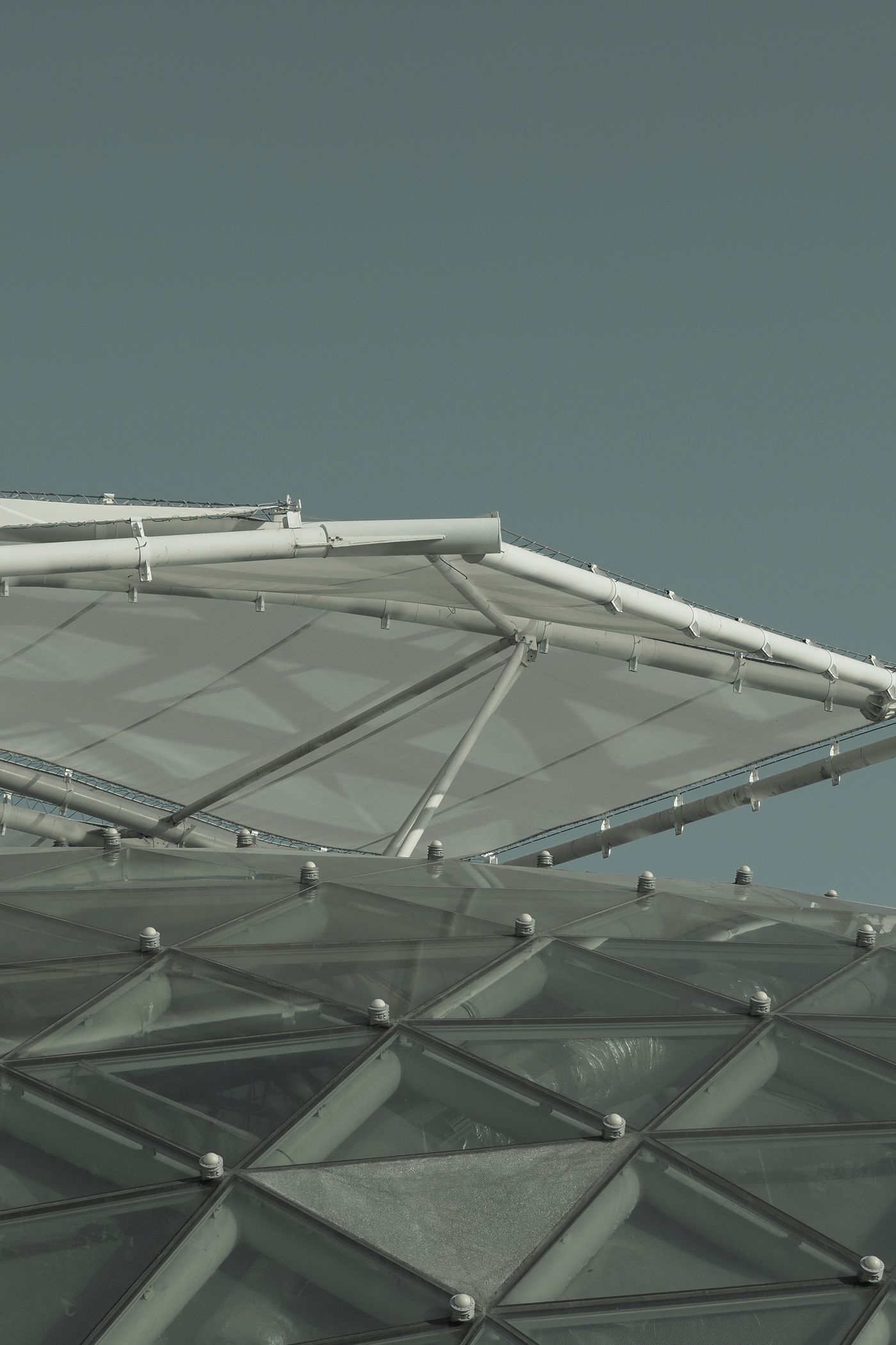Geometric glass and metal roof construction